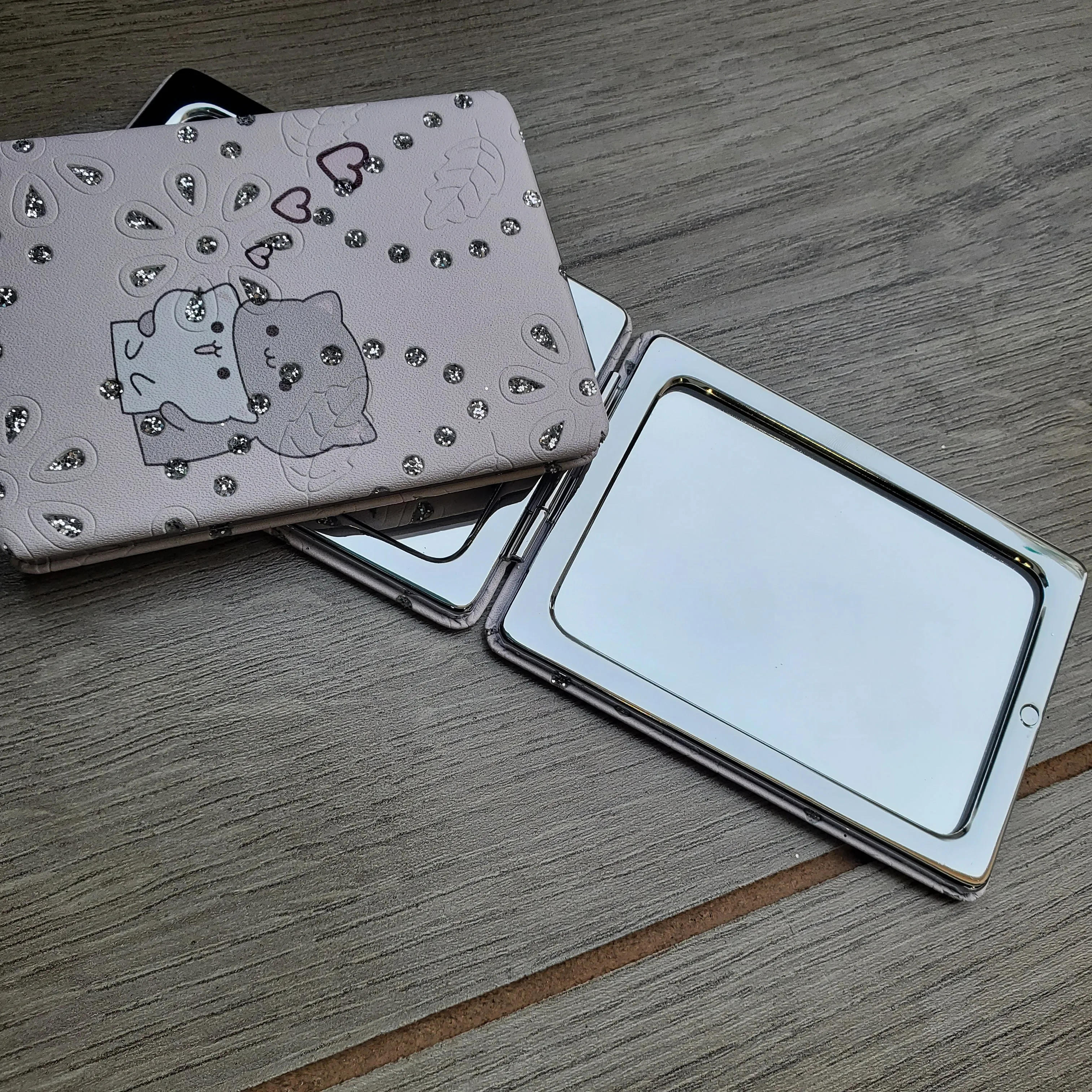Kitty Mirrors