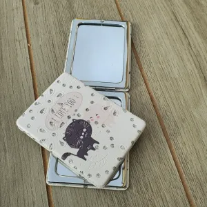 Kitty Mirrors