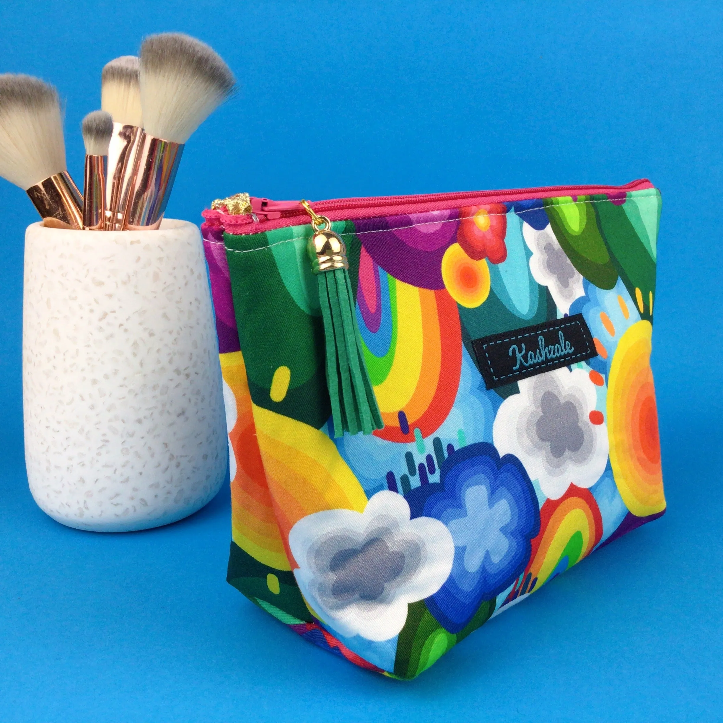 Rainbow Land Medium Cosmetic Bag. Kasey Rainbow Design.