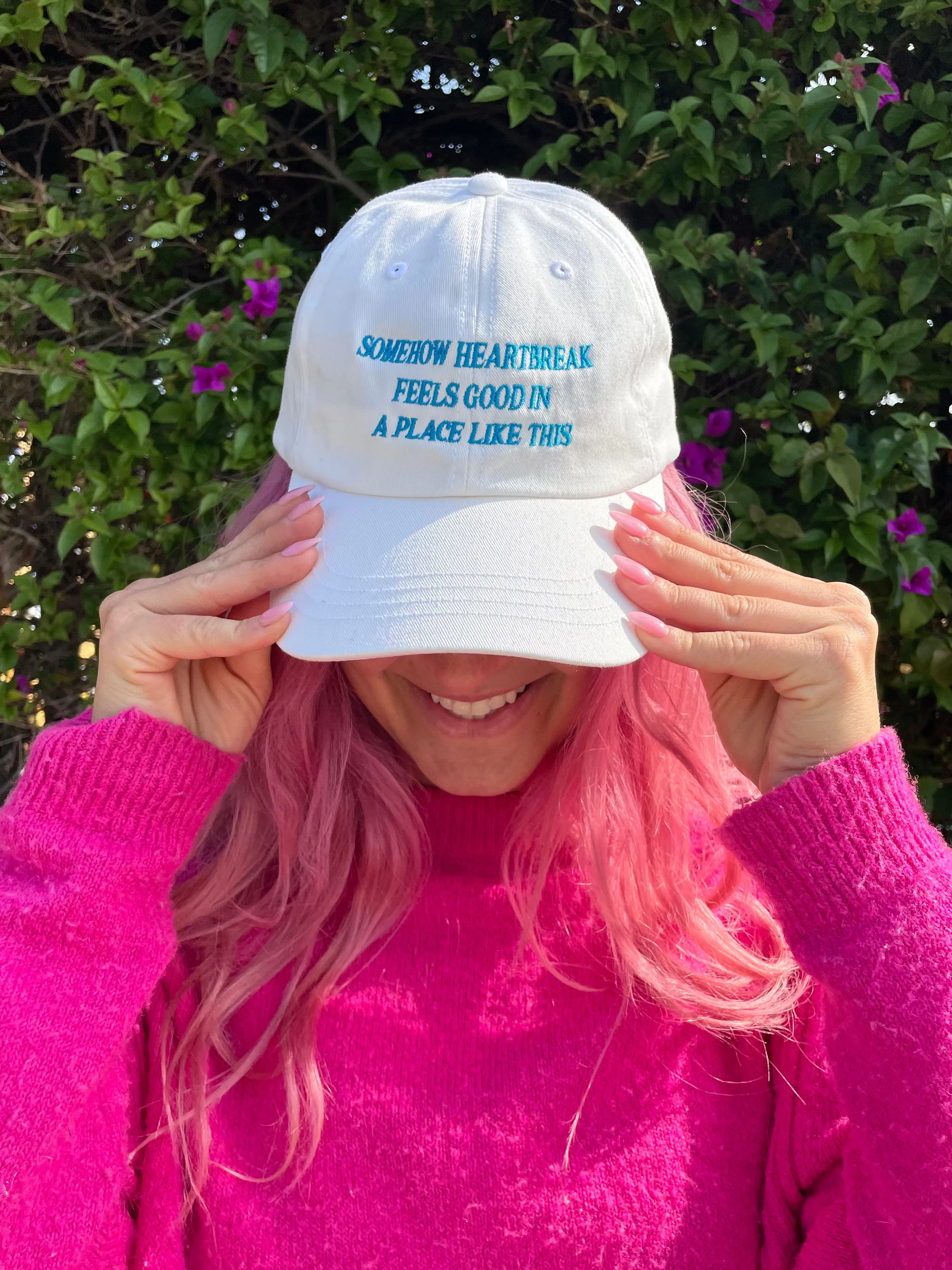 Somehow Heartbreak Feels Good In A Place Like This Hat