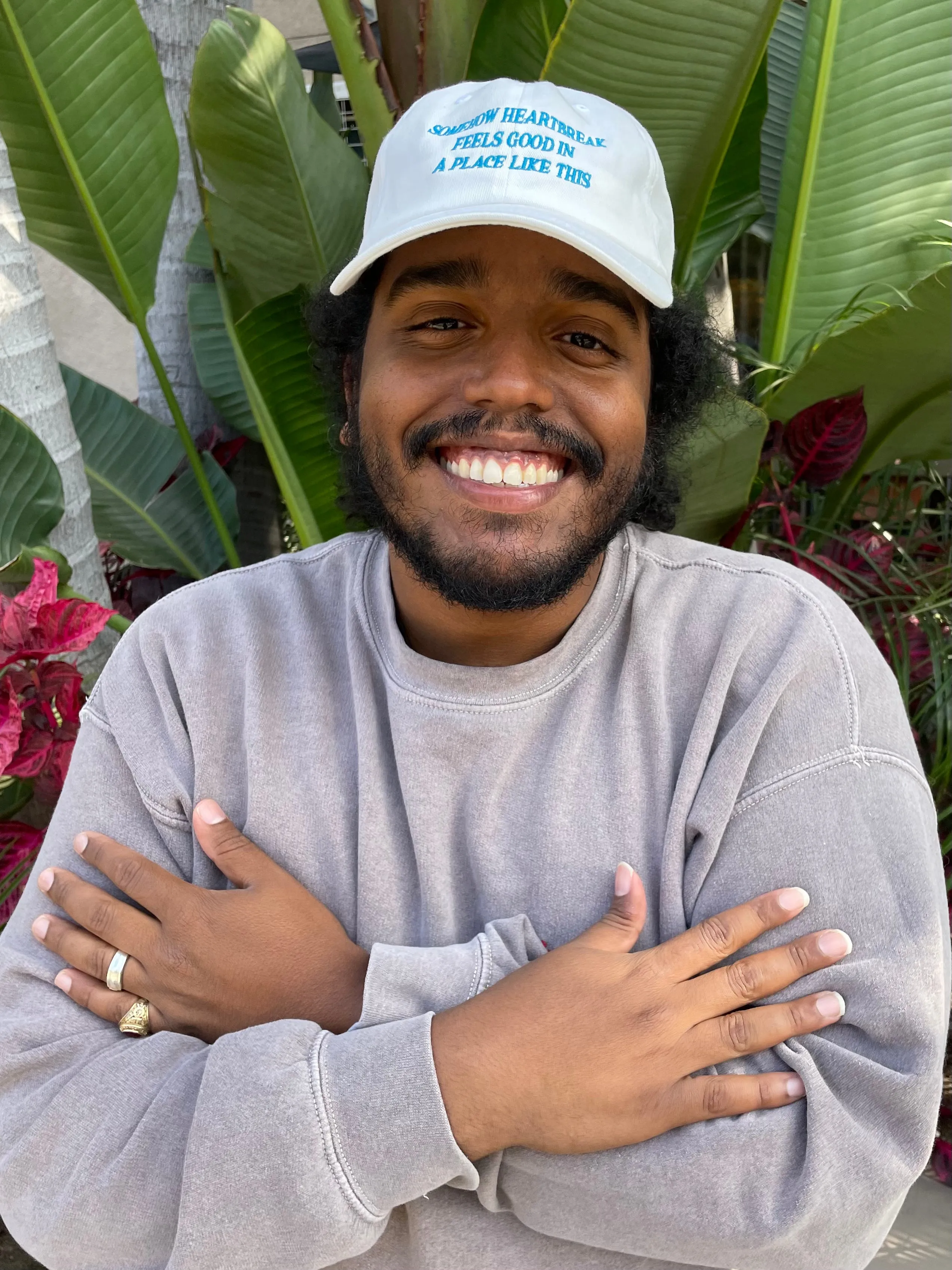 Somehow Heartbreak Feels Good In A Place Like This Hat