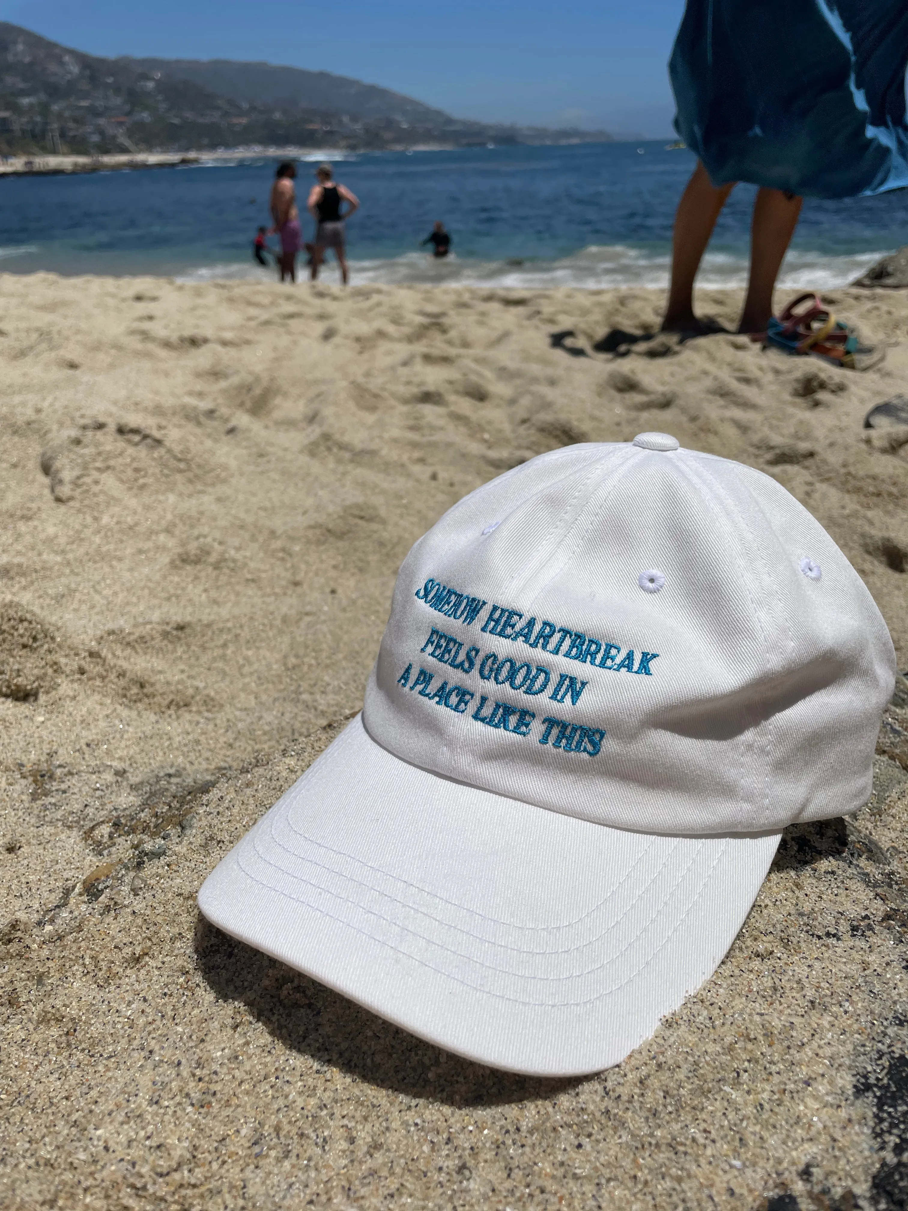 Somehow Heartbreak Feels Good In A Place Like This Hat