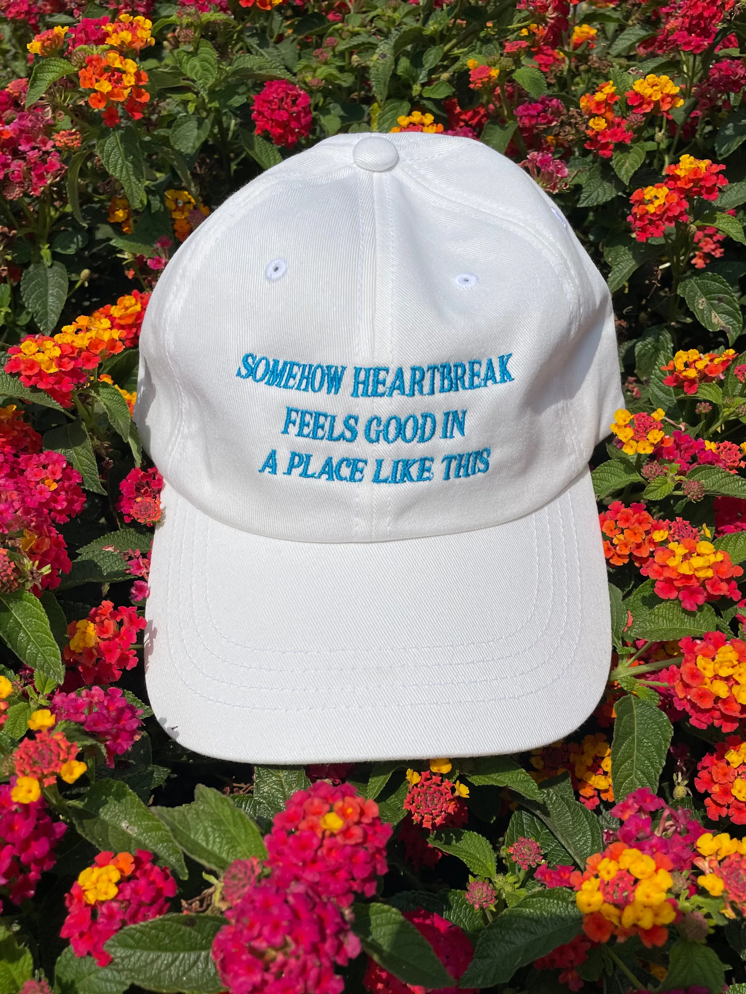 Somehow Heartbreak Feels Good In A Place Like This Hat